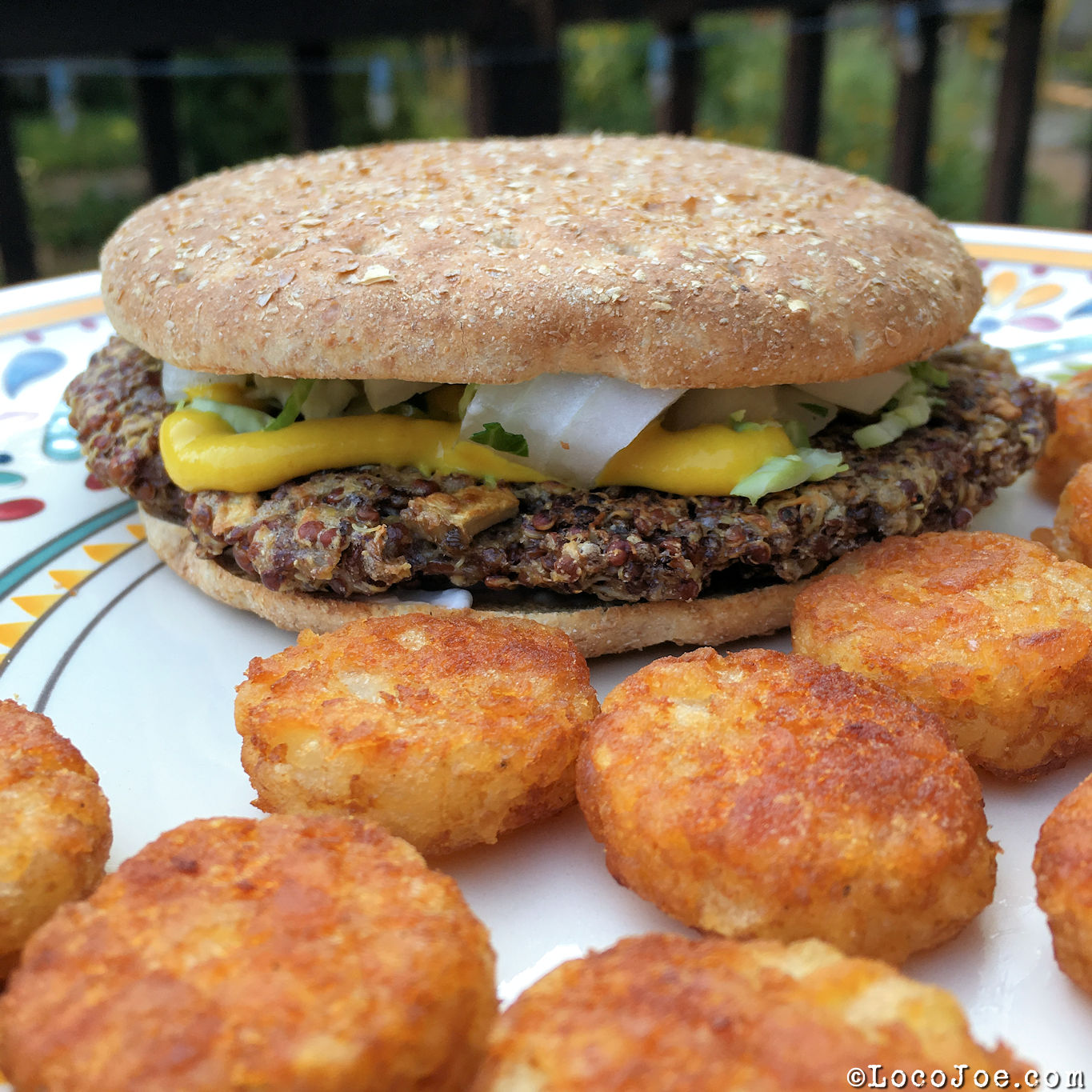 Quinoa Burger on skinny bun and tater-rounds.